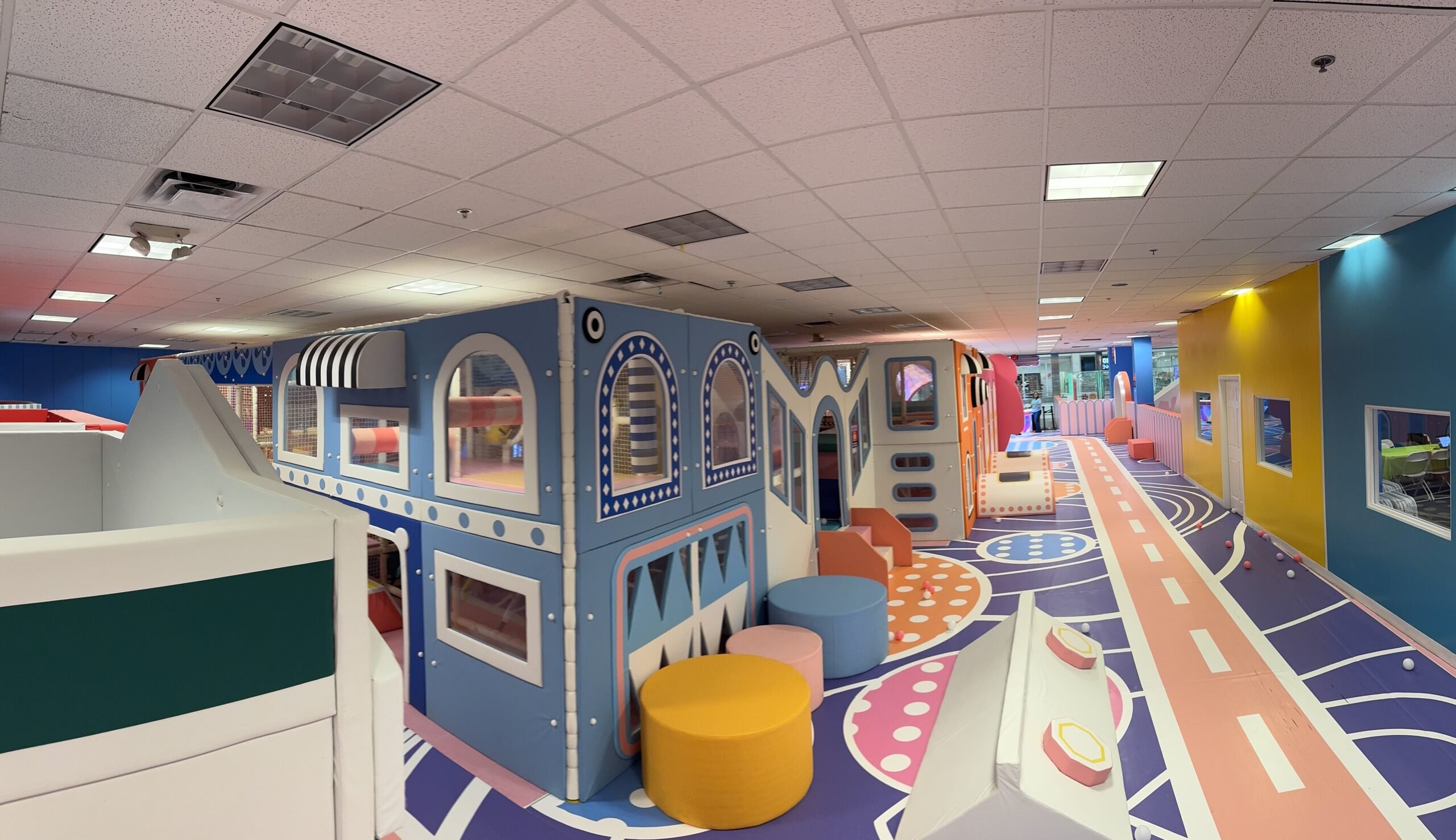 Colorful imagination play village inside Go Bonkers Aurora