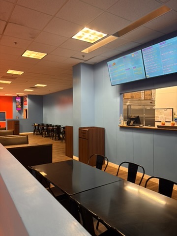 Cafe seating area at Go Bonkers indoor playground in Aurora